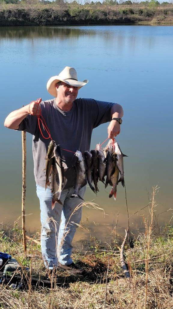 Brian holding fish
