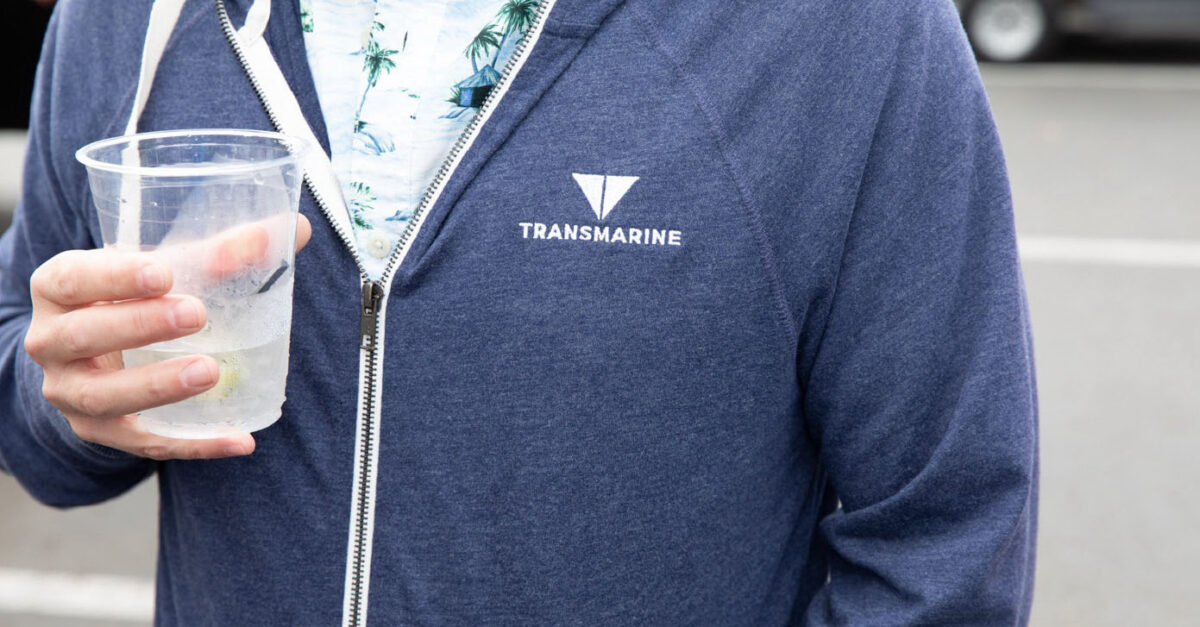 Ian Mantha wearing a hoodie with the Transmarine logo.
