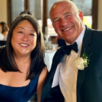 Mark Hanson with his wife in formal wear.